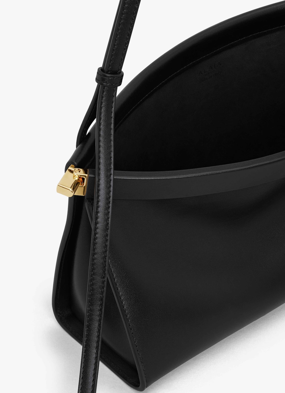 LE CLICK EAST WEST MEDIUM BAG IN LEATHER ALAÏA BLACK LE CLICK EAST WEST MEDIUM BAG IN LEATHER